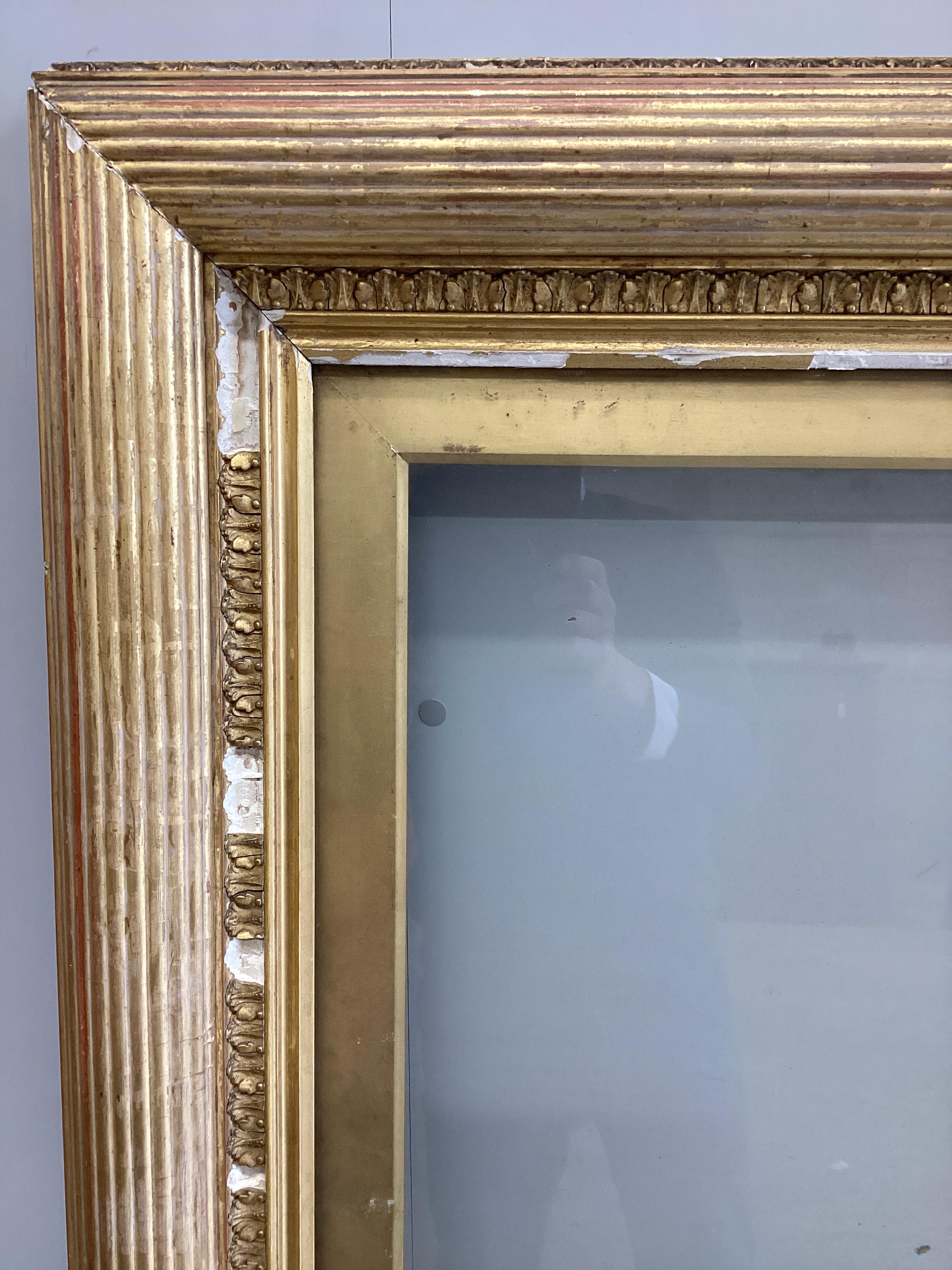 A large 19th century rectangular giltwood and composition picture frame, width 84cm, height 166cm